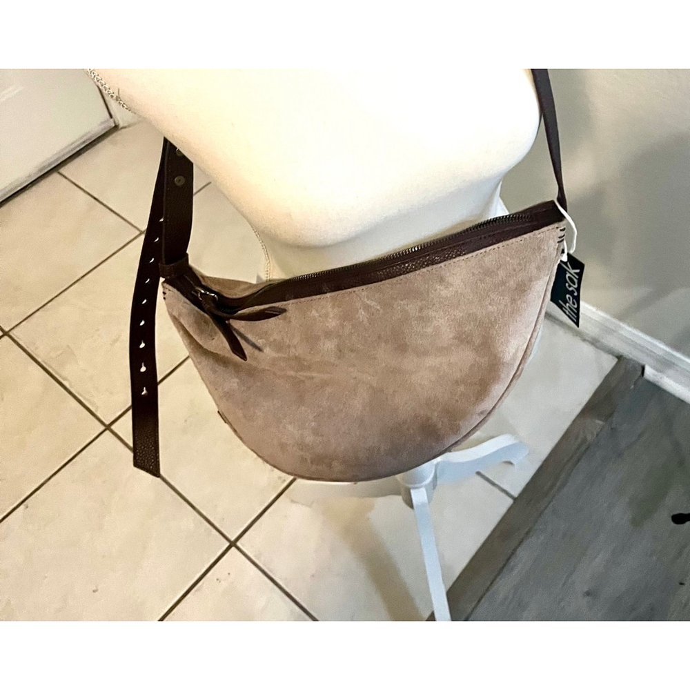 The Sak Taupe Suede Crescent Crossbody with Dark Brown Strap